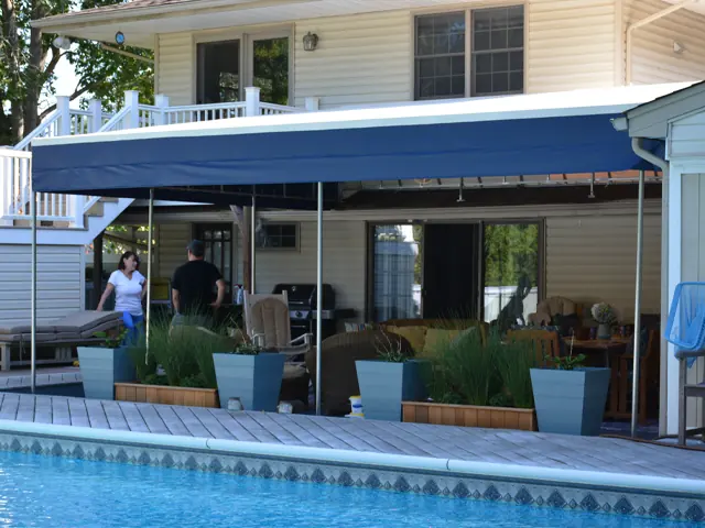 A fixed awning over the windows of a home